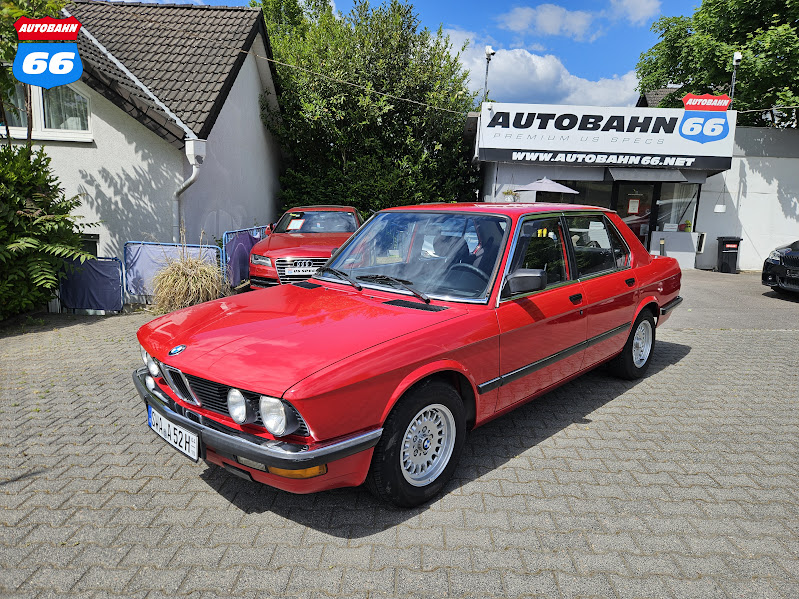 1986 BMW 525e red front three-quarter — classic BMW for sale, Autobahn66 Germany